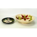 Moorcroft bowl in the columbine pattern 18.5cm, and pin dish in a lilly design, second 11.5cm (2)