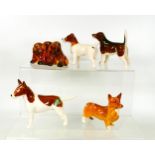 A collection of Beswick Dogs to include Beagle 114, Jack Russell 2109, Puppies 817, Corgi 1736 &