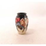 Moorcroft Wild Cyclamen vase . Height 10cm, dated 2001. Boxed