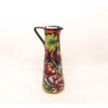 Moorcroft Red Ribbons jug designed by Shirley Hayes. Height 24cm, this is a 2 star collectors club