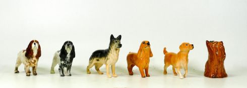 Beswick small dog figures to include Cocker Spaniel 1754 x 2, Alsatian 1762B, Golden Retriever 3270,