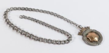 Silver & Gold shield medal with Silver albert chain, 30.9g.