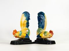 A pair of Art Deco Crown Devon cockerel bookends. Height 18cm