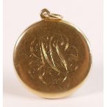 14ct large gold locket, marked 14 and tested as 14ct gold. Engraved with fancy monogram to