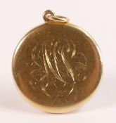 14ct large gold locket, marked 14 and tested as 14ct gold. Engraved with fancy monogram to