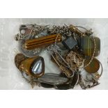 A collection of items including agate pendants, Silver bracelets, 33g, charms, 1951 Five Shillings