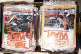 A large collection of images of the war magazines, some still wrapped. Approx 78 issues