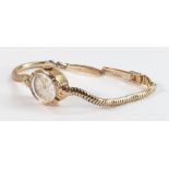 9ct gold ladies Rotary cocktail watch with 9ct gold bracelet, 13g.