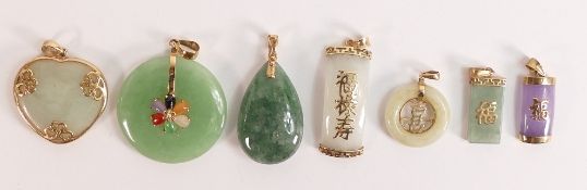 Seven x 9ct gold mounted jade / hardstone pendants, 4 of these in the Chinese style.