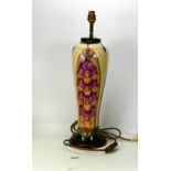 Moorcroft large lamp base in the foxgloves pattern, measuring 37cm high, excluding wooden base &