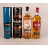 Four bottles of whiskey including Tormore single Speyside malt & Glenfiddich both 70cl, in