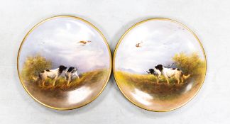 Two Crown Devon hand painted plates with gun dogs, signed R Hinton. Diameter 24.5cm, pattern 0929 (