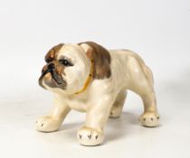 Crown Devon model of a bull dog, painted with a brown face wearing a yellow collar. Height 10cm