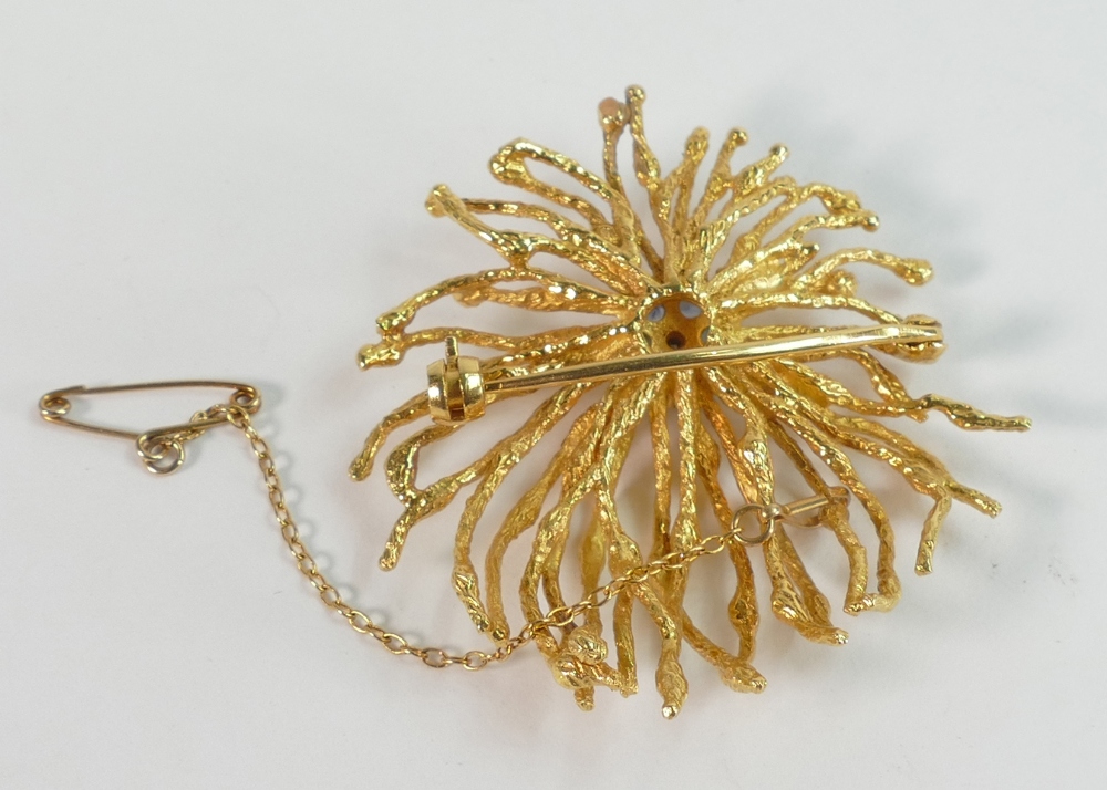 Higher carat gold designer style brooch set with blue stones surrounding a central white stone. Un - Image 2 of 2