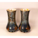 A pair of Crown Deven Birch patterned lustre vases . Height 23cm
