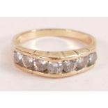 14k gold & diamond 7 stone ring (0.7ct), each diamond about 10 points in size, marked 14k & tested