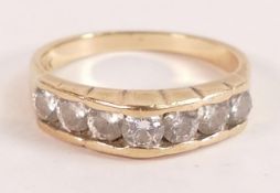 14k gold & diamond 7 stone ring (0.7ct), each diamond about 10 points in size, marked 14k & tested