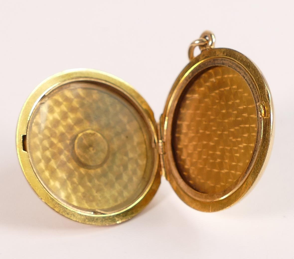 14ct large gold locket, marked 14 and tested as 14ct gold. Engraved with fancy monogram to - Image 2 of 3