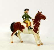 Beswick girl on skewbald pony 1499