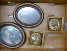 Two Edwardian oval framed photographic portraits together with two small framed circular tiles (4).