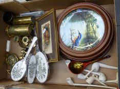 A mixed collection of items to include brass ware items, old clay pipes, framed wall plates,