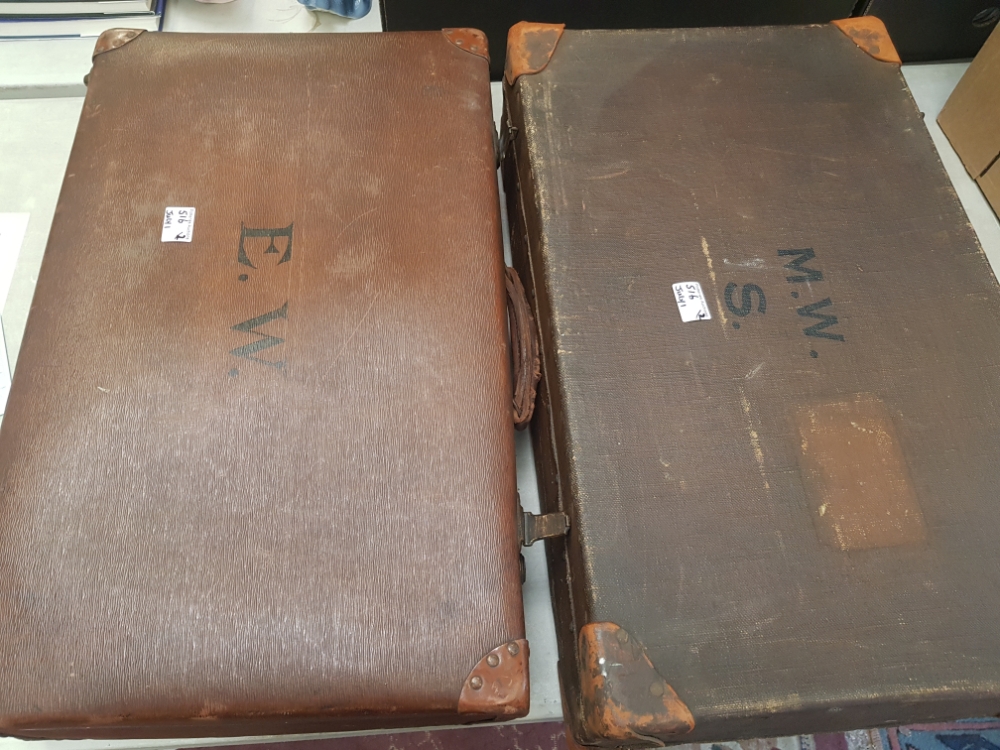 Two pieces of vintage luggage to include large suitcases initialled EW on...