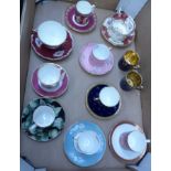 A collection of tea and coffee cup and saucers to include Wedgwood Dancing Hours pattern, Wedgwood