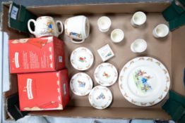 A collection of Royal Doulton Bunnykins breakfast ware to include twin handled mug, egg cups, plate,