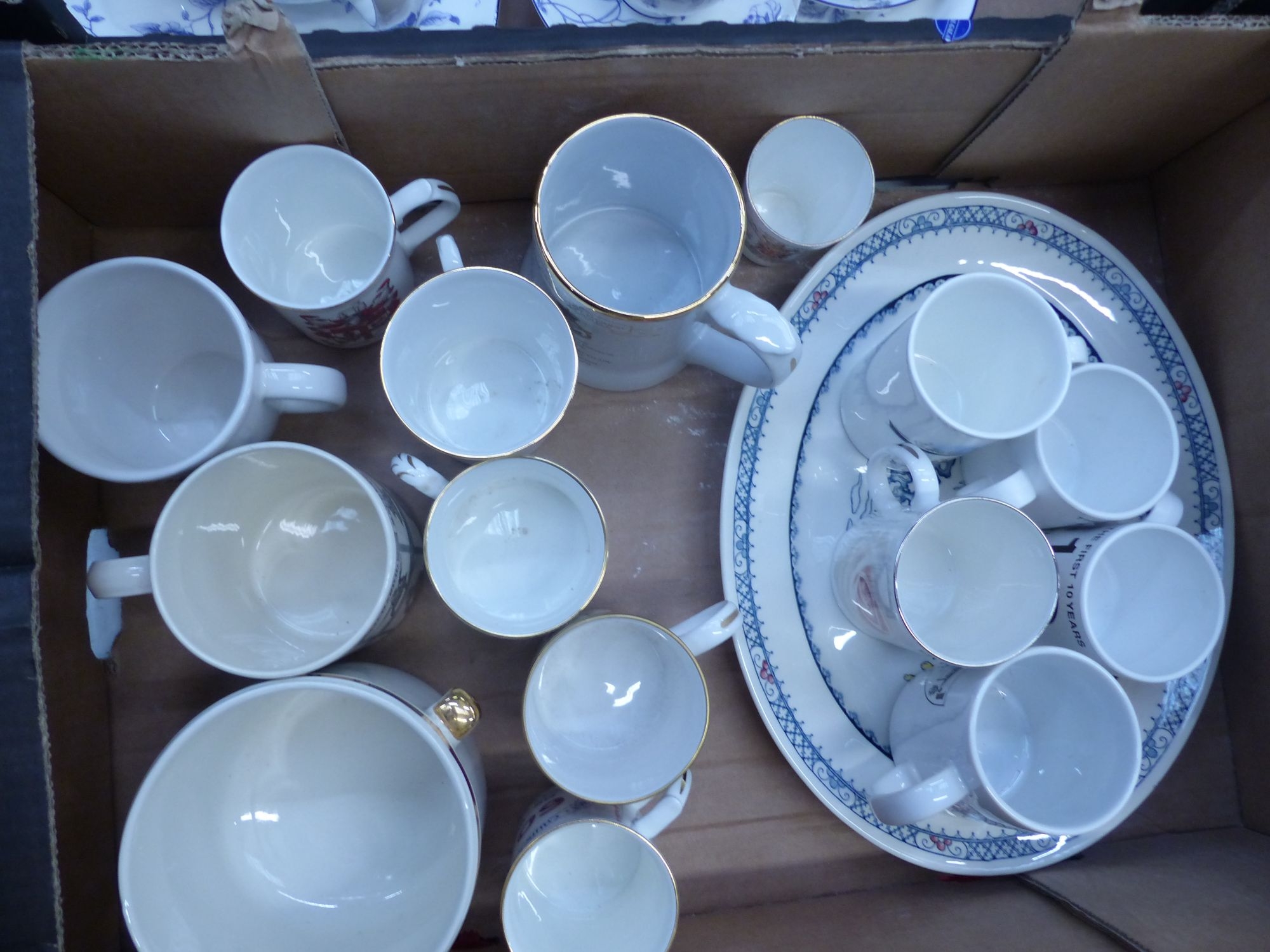 A collection of ceramic items to include Crown Devon platter, Wade tankard, Royal Worcester