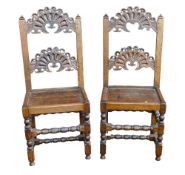 Pair of carved Oak hall chairs on Bobbin Twist supports (a/f -central panel damage) (2)