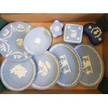 A collection of Wedgwood jasperware items to include wall plates, plaques and trinket dishes.