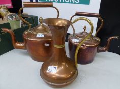 Two copper kettles together with a copper and brass jug, height of tallest 32cm (3).