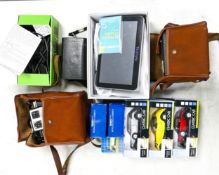 A mixed collection of items to include nav pal boxed sat nav, duro branded mobile phone, brownie