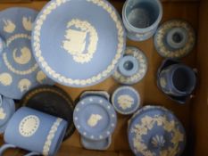 A collection of Wedgwood jasperware items to include Christmas plates, tankard, lidded pots, pin
