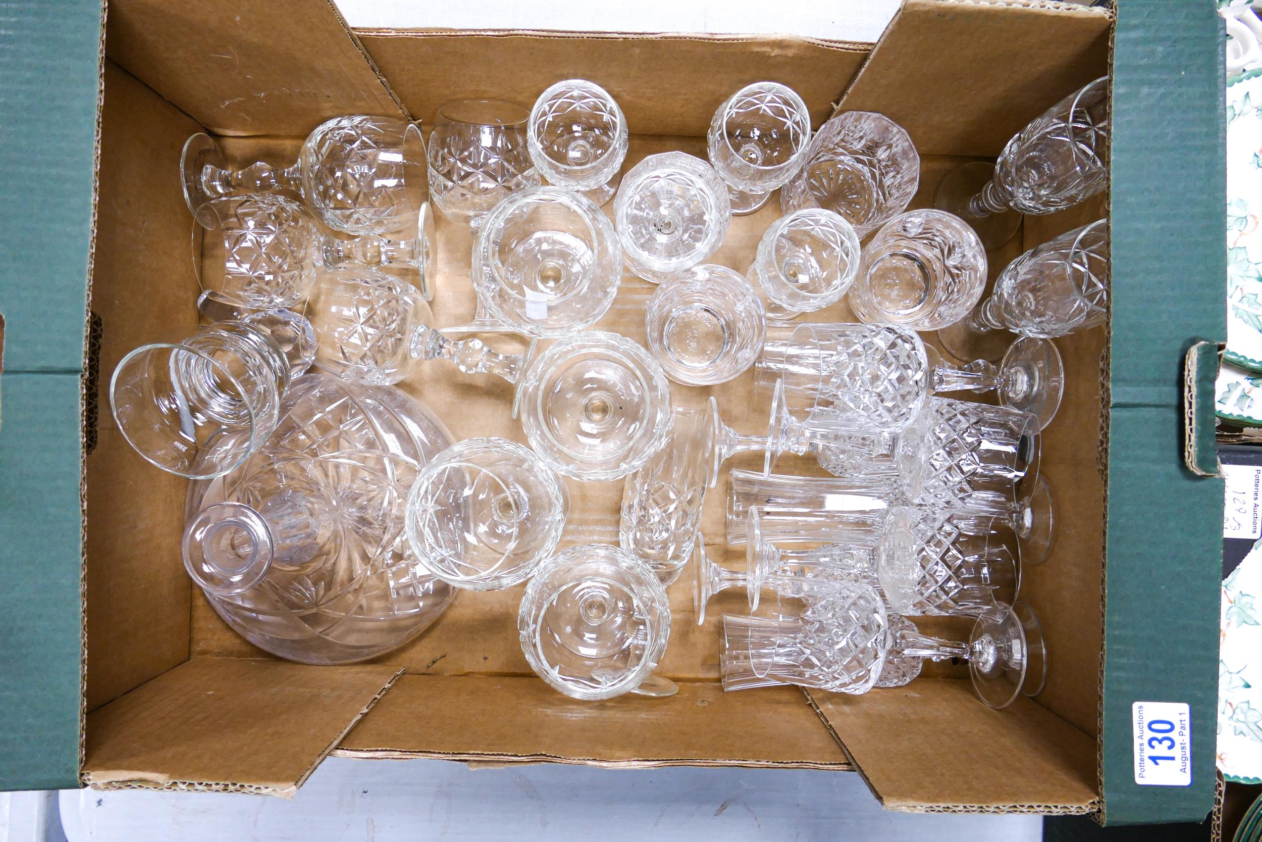 A quantity of cut glassware to include a decanter, tumblers, flutes and brandy glasses etc.