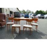 Mid Century extending dining table together with four chairs