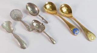 Georg Jensen silver year spoons 1972 & 1973, together with two antique silver tea caddy spoons,