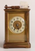 Mid-late 19th century brass carriage clock. bevelled glass panels to top and sides, Gothic numeral