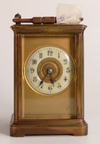 Mid-late 19th century brass carriage clock. bevelled glass panels to top and sides, Gothic numeral