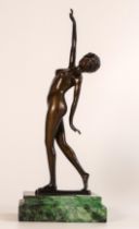 Art Deco bronze figure of standing nude lady, signed ENIS and mounted on green onyx plinth, h.29cm.