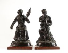 George Maxim, pair of bronze figures on marble bases, modelled as male snuff-taker on a pile of