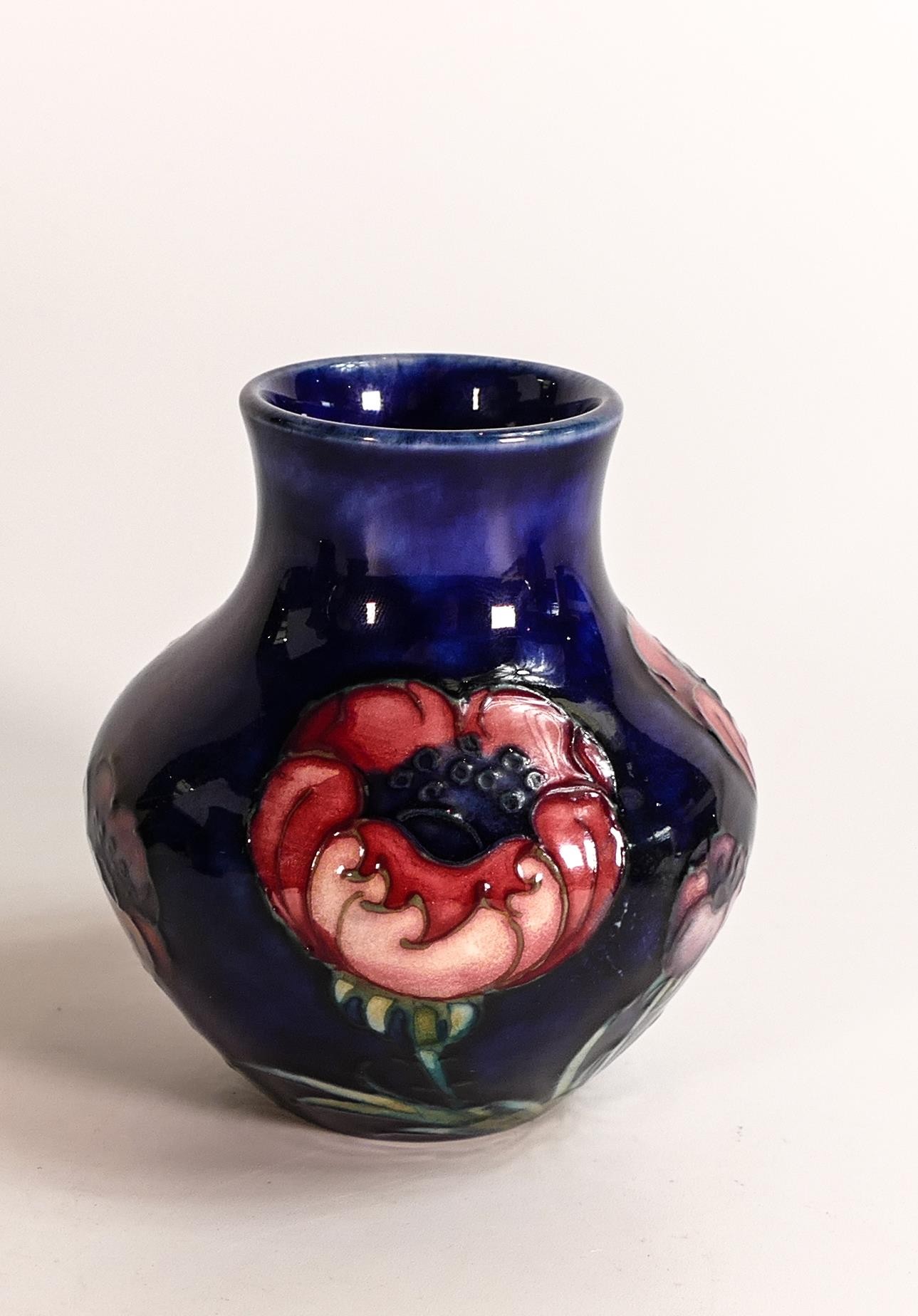 William Moorcroft small vase decorated in the big Poppy design, c1920s, h.9cm.