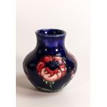 William Moorcroft small vase decorated in the big Poppy design, c1920s, h.9cm.