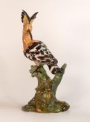 A rare Wade Earthenware model of a Hoopoe Bird perched on a tree branch, designed by Colin