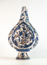 16th century Persian pottery vase. Floral and arboreal decoration in monochrome blue and grey