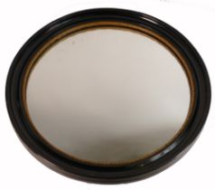Regency ebonised and parcel gilt convex circular wall mirror. Diameter: 43.5cm