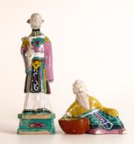 Two late 19th century Chinese Daoist figures; depicting He Xian Gu of the Eight Immortals and