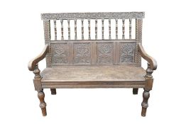 Jacobean style carved Oak bench. H 104cm x L 122 x D 58