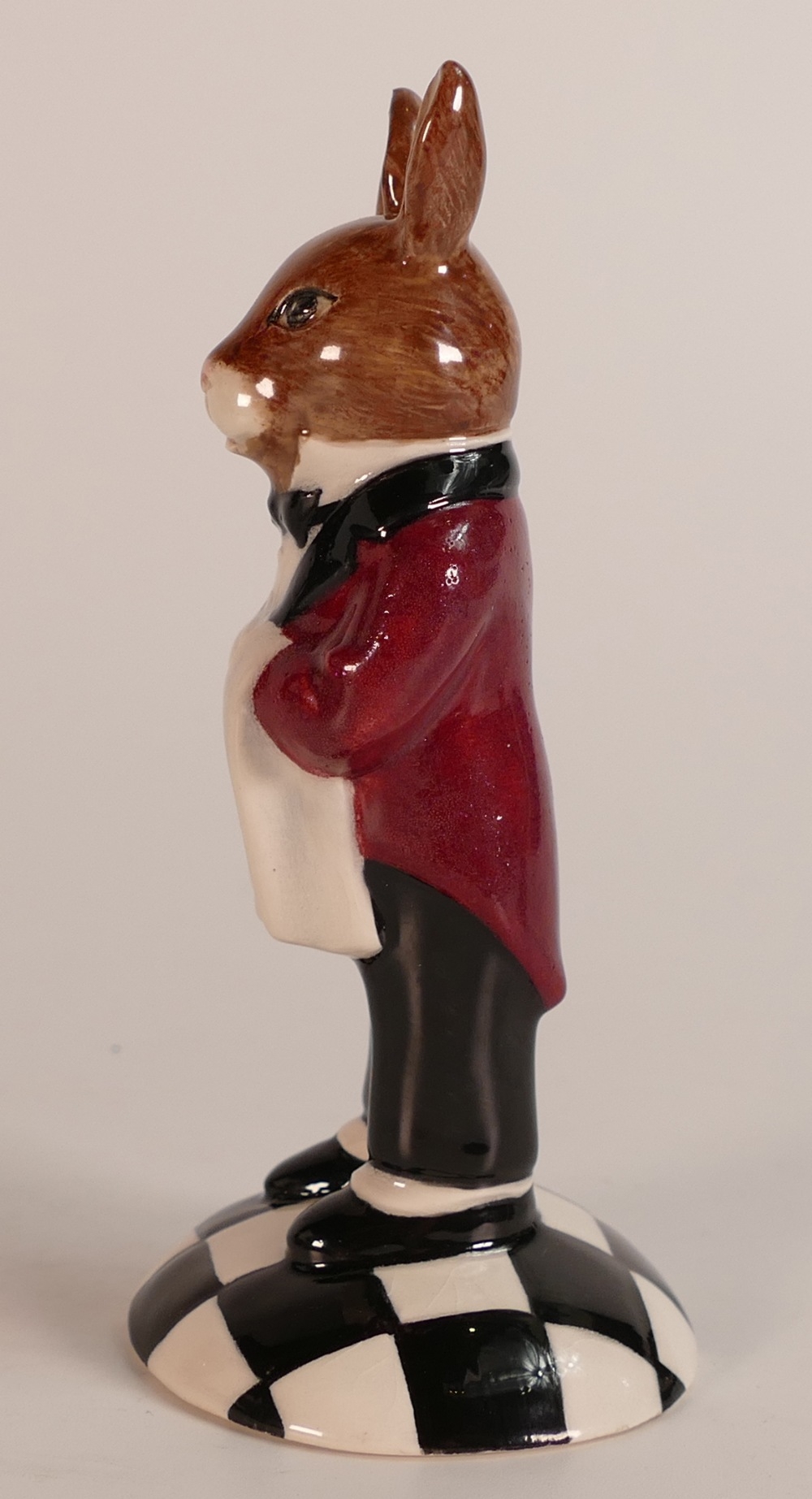 A Royal Doulton prototype Bunnykins figure of a Hotel Waiter holding a serviette and standing on a - Bild 5 aus 6