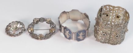 A collection of silver and white metal jewellery including bracelets, brooches etc. (4)